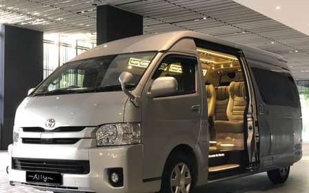 SG Translado privado do aeroporto / cruzeiro num Minibus de 13 lugares